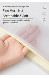 Vue détaillée du filet à linge à mailles fines blanches avec fermeture éclair jaune vif
