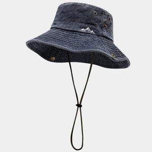Detail of dark grey washed denim outdoor hat with white mountain embroidery and vent holes