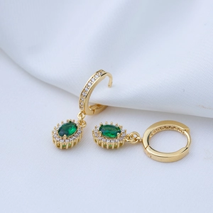 Elegant gold earrings featuring oval green stones and sparkling white cubic zirconia