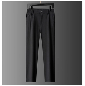 Detail of premium black business trousers with elastic waist and fine fabric texture