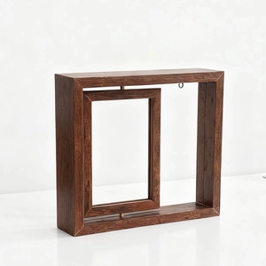 Detail view of the rotating wooden double-sided picture frame with dark brown wood grain