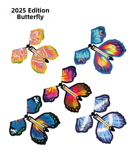 Detail view of five colorful butterfly toys with vibrant gradient wings and realistic patterns