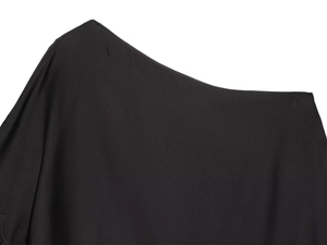 Close-up of the asymmetrical neckline and smooth fabric of this black casual women's top