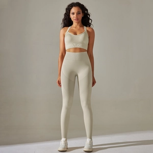Breathable oatmeal ribbed seamless yoga set featuring sports bra and high-waisted leggings