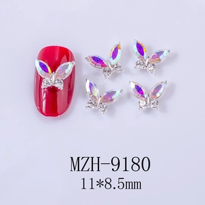 Macro view of 3D aurora butterfly nail gems with iridescent gems and alloy base 11x8.5mm