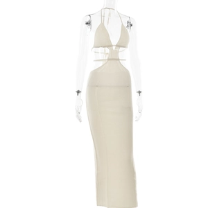Detail of cream knit halter dress showing hollow-out waist and intricate lace-up design