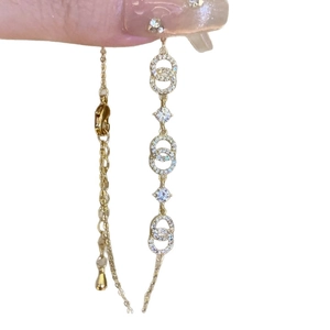 Elegant 18k gold plated bracelet with interlocking crystal motifs and round zircon stones