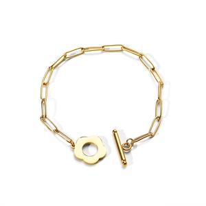 Detail of 18k gold plated stainless steel chain bracelet with floral toggle clasp and T-bar