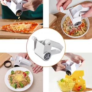 Rotary cheese grater with manual handle for shredding hard cheese and kitchen use