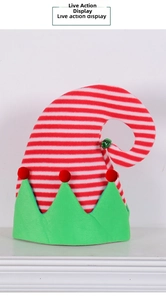 Detail of a Christmas elf hat with red white stripes, green bell and pom-poms accents