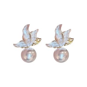Elegant gold butterfly pearl drop earrings featuring iridescent sheen on white background