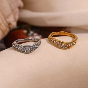 Irregular wave rings in gold and silver finish with sparkling pave zircons