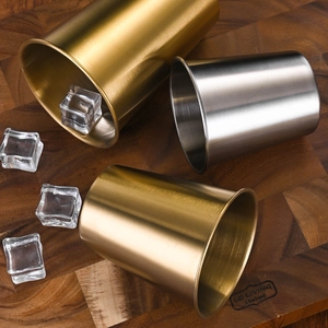 Industrial 304 stainless steel beer cups in gold and silver finish with ice cubes