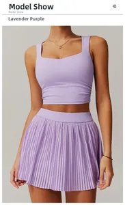 Detail of lavender purple pleated tennis skirt and fitted tank top for women workout