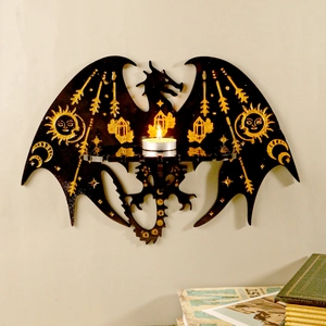 Applique murale dragon noir gothique avec symboles célestes dorés et bougie allumée