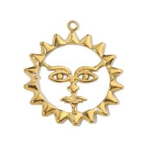 Close-up of golden sun face pendant with hammered texture and hollow sunbeam details