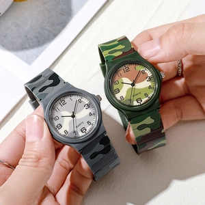 Detail showing grey and green camo quartz watches for students with plastic straps
