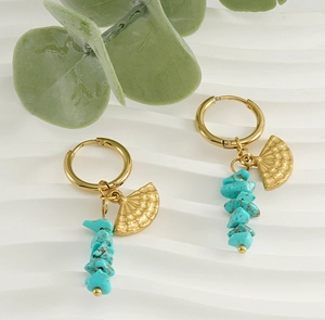 Detail of 18k gold-plated fan-shaped earrings with dangling blue turquoise stone beads