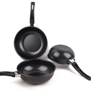 Three-piece black non-stick induction cookware set with fry pans in various sizes