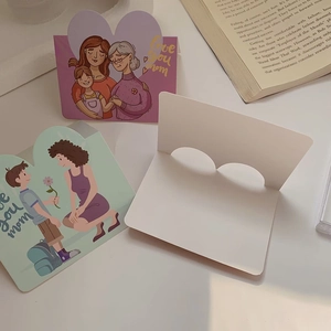 Three Mother's Day cards with 'Love You Mom' text and heart-shaped cutout design