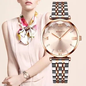 Women's minimalist quartz watch with rose gold dial and diamond-cut glass face