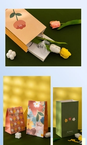 Detail of floral gift bags with 'Best Wishes' text and thick cardstock paper texture