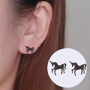 Detailed view of minimalist black unicorn stud earrings for women in trendy animal design