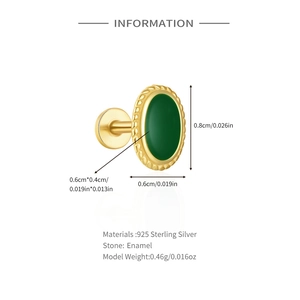 Detail view of 925 sterling silver gold plated earring with green enamel inlay