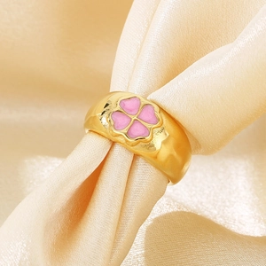 10mm wide gold plated stainless steel ring featuring pink enamel four-leaf clover design