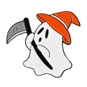 Detail of cute white ghost enamel pin with orange wizard hat and scythe for Halloween