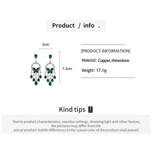 Detailed size chart showing 3cm width and 7.3cm height for rhinestone tassel earrings