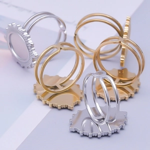 Adjustable gear-shaped ring bases in gold and silver stainless steel for DIY jewelry