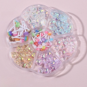 Detail of MH-08 nail art kit with colorful lollipops and aurora heart resin charms