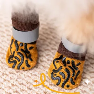 Extended anti-slip pet socks for dogs with double-sided yellow knit and safety straps