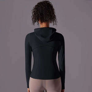 Rear view of a black hooded sports jacket showing ergonomic seams and slim fit design