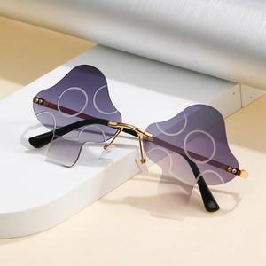 Fashionable mushroom-shaped rimless sunglasses with purple gradient lenses and gold metal frame