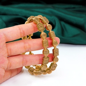 Golden titanium steel spring wire bracelets with geometric lantern hollow coil design