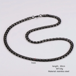 Detail of 7mm black stainless steel box chain necklace with 60cm length and 54g weight