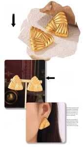 Detailed views of gold triangular earrings with textured stripes on model and display