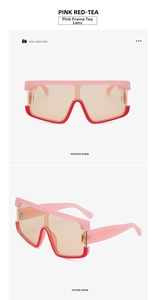 Dettaglio occhiali da sole oversize rosa e rossi con lenti color tè