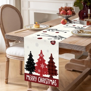 Plaid Christmas tree table runner with Merry Christmas print on wooden dining table