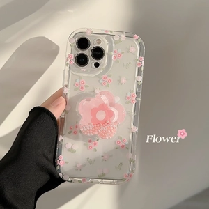 Detailed view of floral iPhone case with 3D flower phone socket and pearl infill