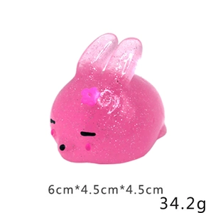 Pink glitter rabbit squeeze toy with dimensions 6cm x 4.5cm and 34.2g weight