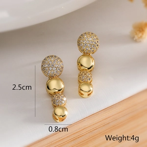 Detail showing 18K gold plated teardrop earrings with zircon, size 2.5cm and 4g weight