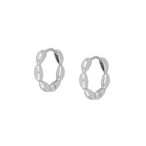 Detailed view of silver beaded hoop earrings with high-polish finish and link design