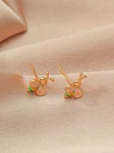Exquisite gold bee stud earrings with colorful enamel wings on champagne silk background