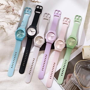 Colorful silicone quartz watches for women and kids in six pastel shades on a white tray