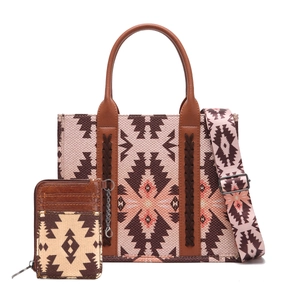 Detail of bohemian tote bag with geometric pattern, leather trim and detachable wide strap