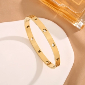 Polished 18k gold-plated titanium steel star cut-out bangle for women with hinge closure