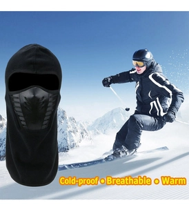 Close-up of black fleece balaclava with air flow mask and skiing scene display